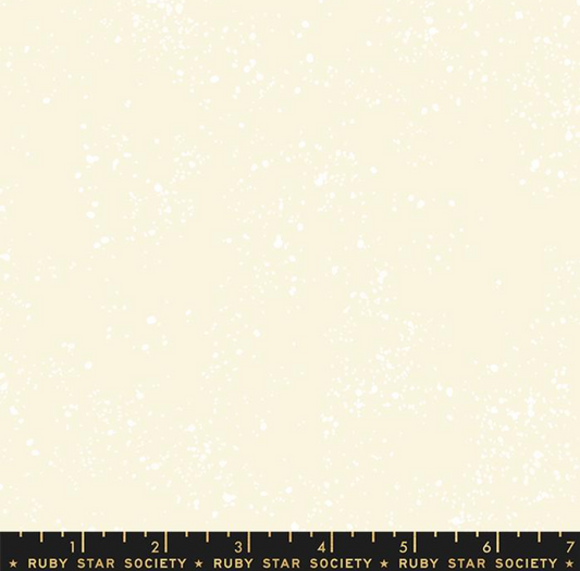 Fabric swatch with a subtle pattern on a beige background, featuring 'Ruby Star Society' label.